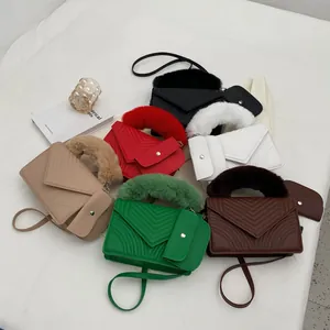 Minimalist V-quilted faux leather handbag with fluffy faux fur handle and coin pouch
