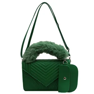Green V-quilted handbag with plush faux fur handle and detachable small pouch