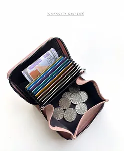 Internal view showing accordion slots of pink lychee leather card holder wallet