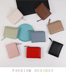 Flat lay of slim lychee pattern leather wallets in eight colors with L-shaped zippers