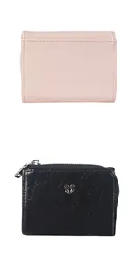 Nahaufnahme von rosa und schwarzen Vintage-Geldbörsen mit Lederstruktur in Herzform