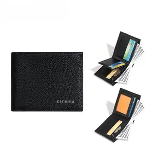 Detail view of black pebble leather wallet showing functional card slots and photo window