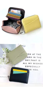 Detail of multi-slot accordion card wallet featuring premium litchi grain texture