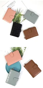 Close-up of crocodile texture PU leather card holder with metal buckle and side loop