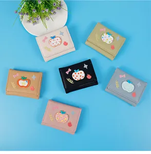 Detailed view of six pastel lychee pattern folding wallets with cute apple embroidery