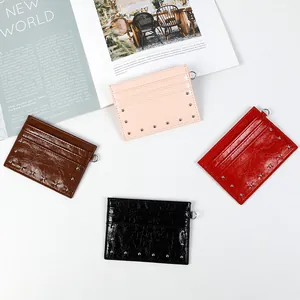 Chic rivet card holder in pink, brown, red, and black with shiny faux leather texture