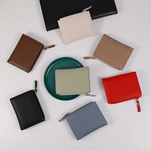 Slim leather zip wallets for women in seven colors with textured lychee grain finish