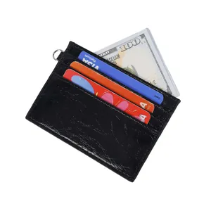 Black cracked leather card holder with silver D-ring and multiple functional slots