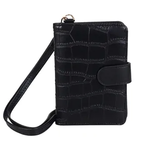 Portable black crocodile embossed passport holder and travel document wallet with neck strap