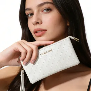 White woven leather clutch bag with golden wristlet and classic star logo design