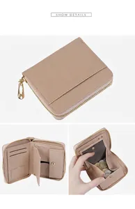 Detail view of pink litchi grain wallet with multi-card slots and secure coin pocket