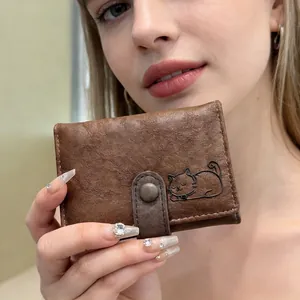 Brown vintage cat pattern tri-fold wallet for women with snap closure and retro texture