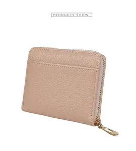 Detailed view of apricot lychee pattern leather wallet with zip closure and card slot