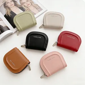 Collezione di portafogli in pelle dai colori macaron con pratica chiusura a zip a U