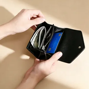 Detailed interior of black lychee grain leather wallet with chain and multiple card slots