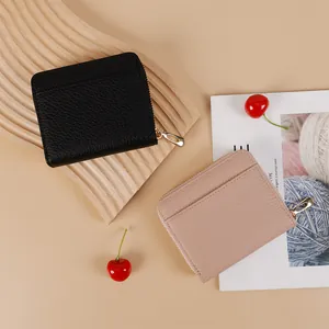 Litchi pattern leather zip wallets in black and pink with multiple card slots