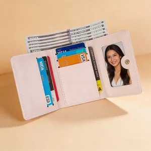 Portefeuille femme rose à trois volets avec nœud, fentes cartes et fenêtre ID