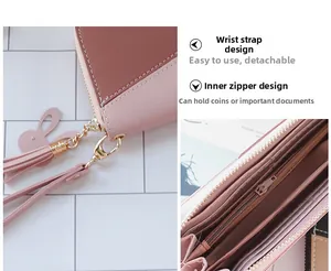 Détails du portefeuille rose avec dragonne amovible et breloque en forme de lapin