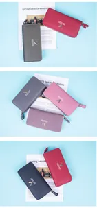Collection of multi-color long PU leather wallets featuring double zippers and V-shaped hardware