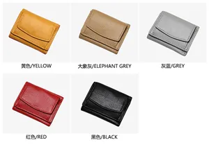 Litchi texture pebbled leather wallet detail showing yellow, grey, red and black colors
