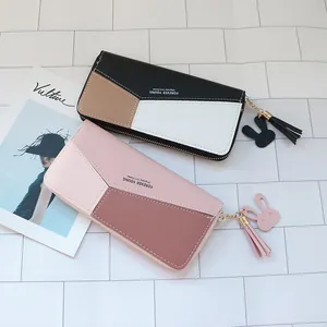 Portefeuille long pour femme en cuir PU avec pompon et design géométrique coloré
