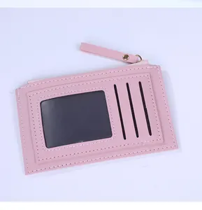 Pink PU leather card holder with cow pattern texture, zipper pocket and ID window