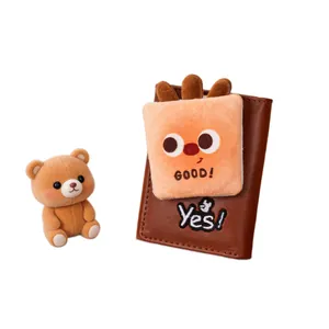 Cute brown faux leather trifold wallet featuring orange plush mascot with Good and Yes embroidery