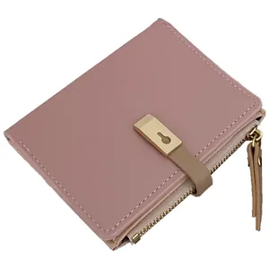 Short bifold PU leather wallet for women with lychee texture and gold clasp in pink