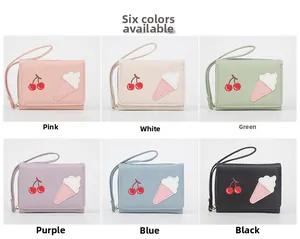 Selection of six colorful women's small wallets featuring cute ice cream and cherry patches