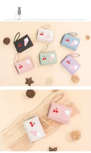 Detailed view of pastel PU leather wallets with cute cherry and ice cream embroidery