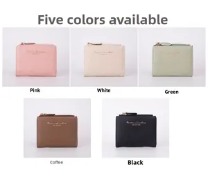 Detail showing five colors of small crocodile texture wallets with gold metal zippers