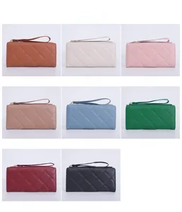 Detailed view of quilted long wallets for women in eight colors with wrist straps