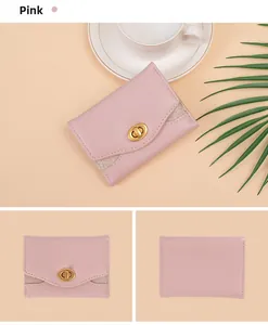 Pink trifold wallet with gold twist lock and glitter trim detail shown in multiple views