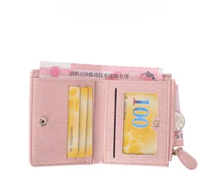 Detailed interior of a pink crocodile texture wallet showing card slots and zipper pocket