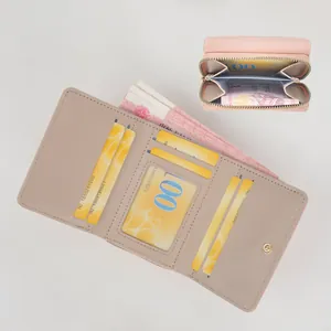 Pink trifold wallet for women with card slots, coin pocket, and clear photo ID window