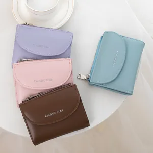 Short minimalist faux leather wallets for women in assorted colors with zip closure