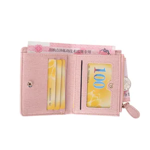 Pink crocodile pattern short bifold wallet with multi-card slots and tassel zipper pocket