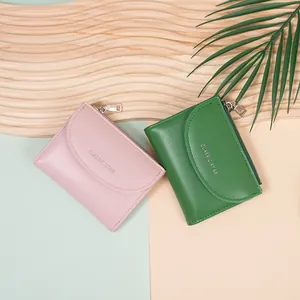 Pink and green minimalist faux leather coin purses with a top zipper and card slots