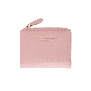 Pink crocodile pattern short wallet with zipper closure and golden sun engraving