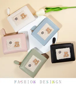 Flat lay of colorful cute cartoon bear zipper coin purses in pastel leather finishes