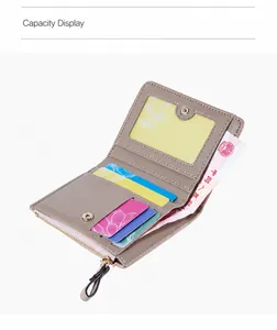 Internal layout of small embroidered wallet showing card slots and zipper compartment
