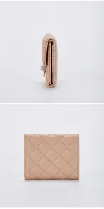 Detailed views of light pink quilted leather wallet with classic rhombus stitch and silver clasp