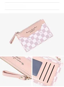 Detail of pink checkerboard card holder showing zipper closure and back card slots