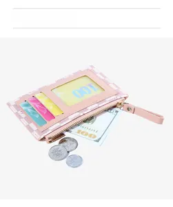 Pink checkered card holder detail showing three card slots and a zipper pocket