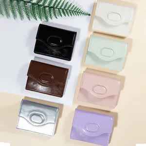 Piccoli portafogli minimalisti in pelle PU da donna in sette colori con fibbia ovale