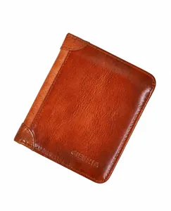 Close-up of premium tan grain leather wallet with precision stitching and GIECHUA logo