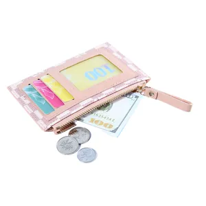 Pink checkered multi-slot card holder and coin purse with zipper on white background