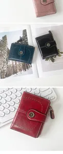 Detail of vintage PU leather wallets in four colors with hollow patterns and flower clasp