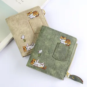 Short minimalist embroidered cat wallets in beige and green faux leather for women