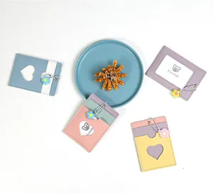 Vibrant dopamine style PU leather card holders with heart cutouts and flower pendants